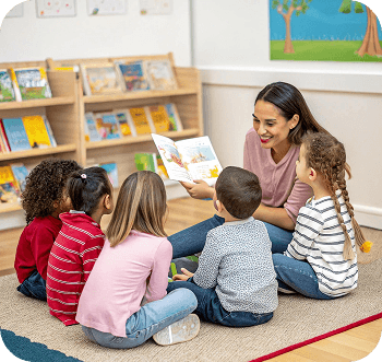 Teacher reading to children in a bright classroom library
